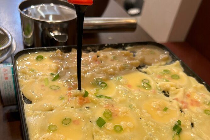 Experience Cooking Takoyaki in its Birthplace, Osaka - The takoyaki lesson: batter, rotating heat, and that crisp-soft texture
