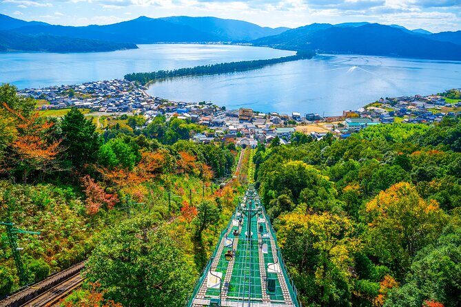 Kyoto Amanohashidate and Ine No Funaya Tour from Osaka - Ine no Funaya: the fishing village where the boats are the backdrop