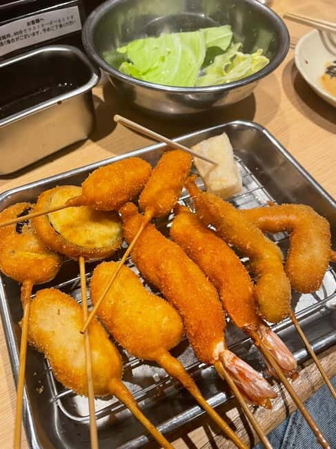 Osaka: All-Inclusive Local Eats & Backstreets Food Tour - Second tasting stop: quicker bites and variety in a short walk