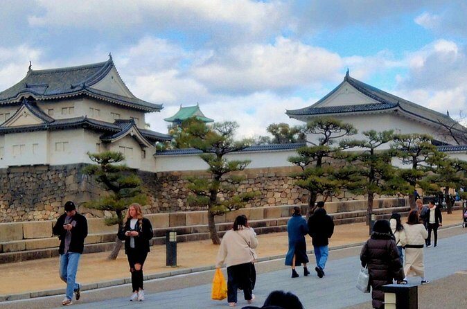 Osaka Castle & Temple Walking Tour with Multilingual Audio Guide - Entering Shitennoji Central Complex: pagoda and Golden Hall close-up