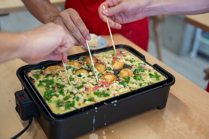 Osaka Home Feast Cooking and Sake Experience - What you eat at the end: a spread you helped create