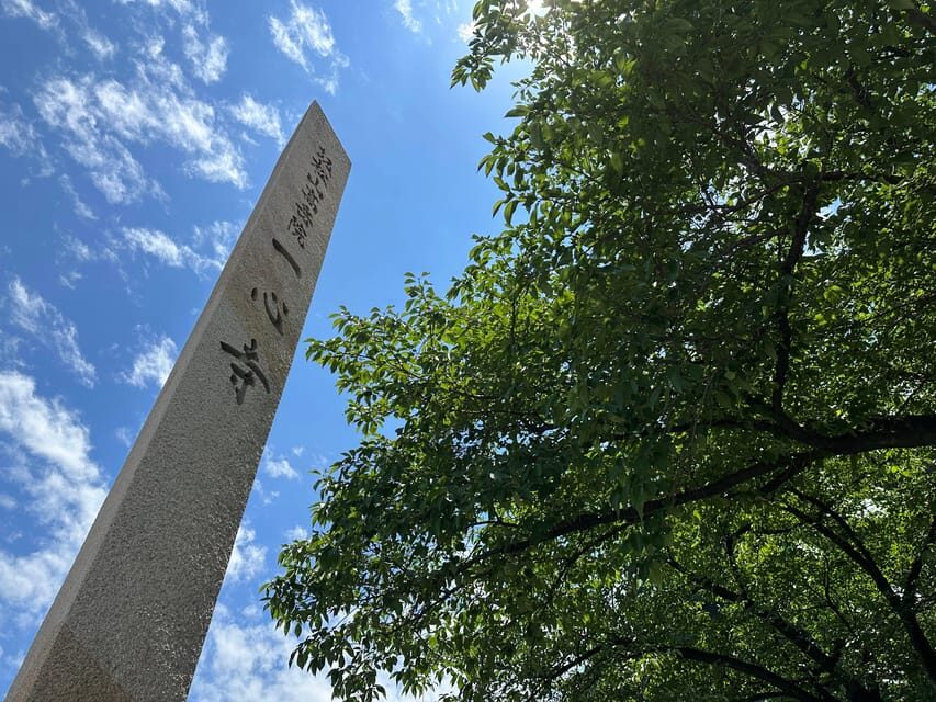 Osaka: Japan’s Oldest Temple & Bone Buddha Walking Tour - Isshinji’s modern gate: tradition meets design today