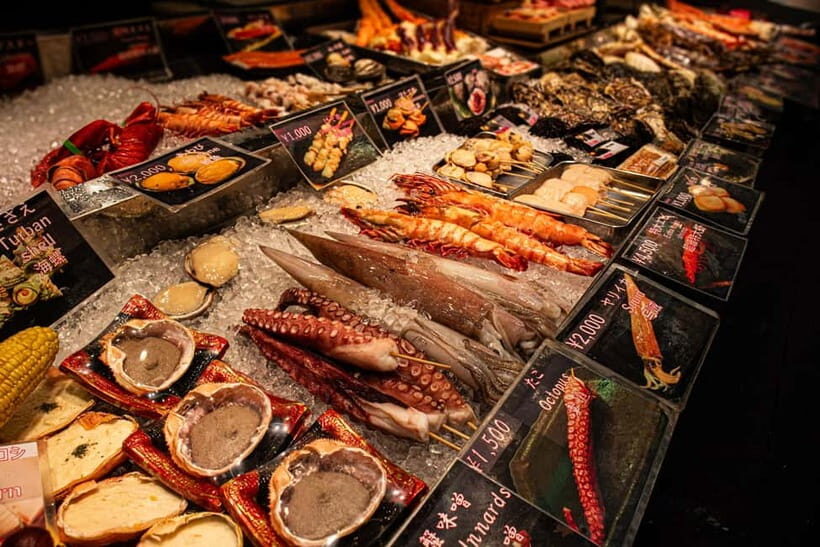 Osaka: Kuromon Market Street Food Tour with Pro Local Guide - Entering Kuromon Market like you know the rules