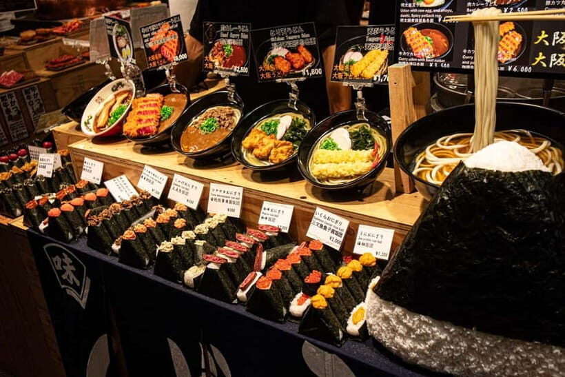 Osaka: Kuromon Market Street Food Tour with Pro Local Guide - Hozenji Yokocho: the alleyway atmosphere shift